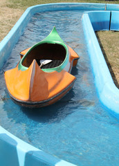 A Canoe on a Fun Portable Water Play Attraction.