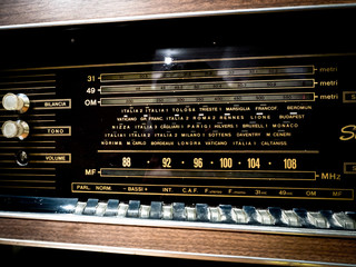 Detail of an old wooden valve radio.