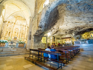 Apulia, Italy - Jul 17, 2018: Inside the shrine of the Sanctuary of San Michele Arcangelo, Monte Sant Angelo, an important pilgrimage site since the early Middle Ages