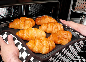 MAN BAKING CROISSANTS