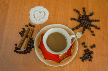 Coffee with milk in a coffee cup.