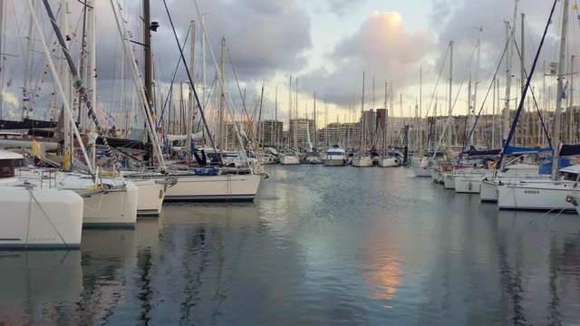 sailboats moored up waiting on the pontoon just days before the arc 2018 atlantic crossing sailing regatta starts during sunset