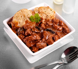 BEEF AND MUSHROOM CASSEROLE WITH DUMPLINGS