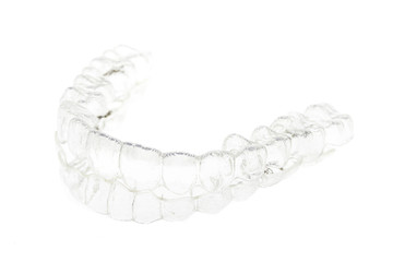 Invisalign bracces or invisible retainer isolated on white background