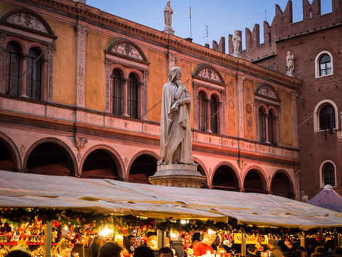 Statue of Dante Alighieri in Piazza dei Signori during the Christmas markets.