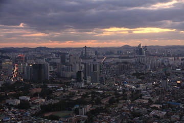 Naklejka na ściany i meble Sunset View of Seoul’s Skyline in South Korea
