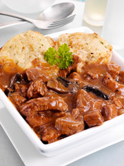 STEAK AND ALE CASSEROLE WITH DUMPLINGS