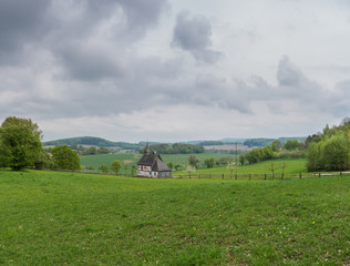 The landscape and an old chapel in Germany