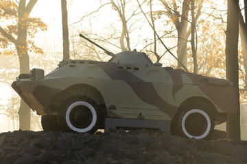 An infantry fighting vehicle, a monument, stands on a pedestal, in a public park. Symbolizes the...