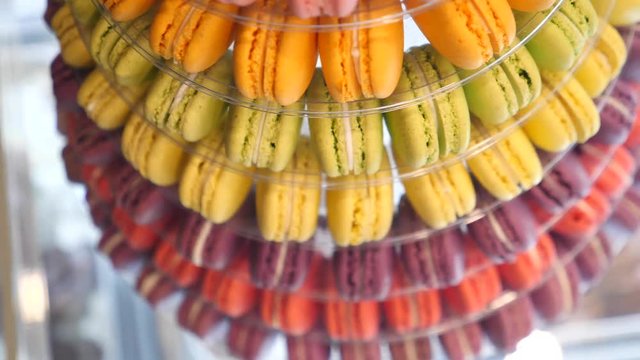Famous Dessert Or Popular Confection: Macaron Tower of Various Colors Displayed In Cafe Bakery.
