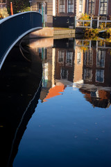Fototapeta na wymiar Leiden, Netherlands:Reflection of the tradional Dutch houses in canal water