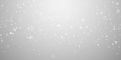 Sparse snowfall Christmas background. Subtle flyin