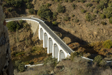 White bridge across a river seen from above in Portugal