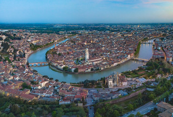 Overlooking the city at Sunset and night time, Verona Italy