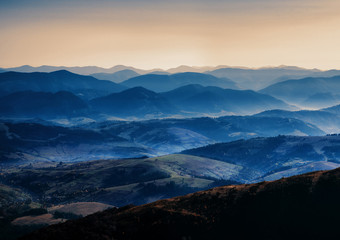 range of mountains on sunrise