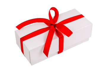 white gift box with red ribbon on white