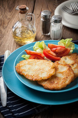 Crispy fried homemade potato pancakes.