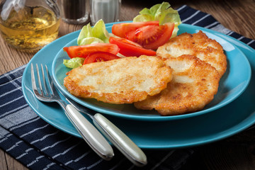 Crispy fried homemade potato pancakes.