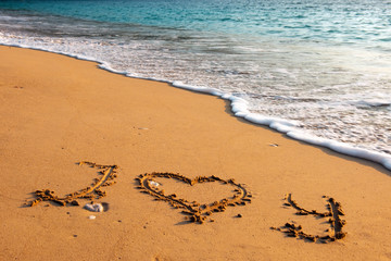Message i love you on sand beach