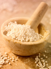 SAGO SEEDS IN PESTLE AND MORTAR