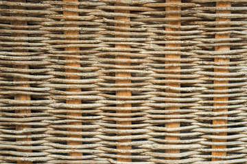 the texture of the fence made of wooden rods. the netting from the tree. part of the fence.