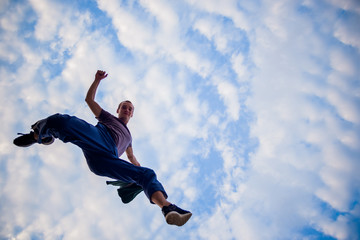 Parkour man doing tricks in the air