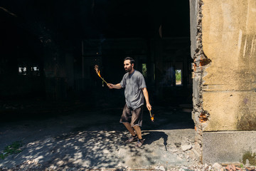 Man while using pyrotechnics outdoors