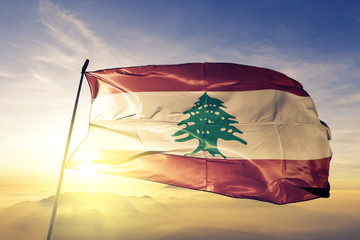 Lebanon lebanese flag textile cloth fabric waving on the top sunrise mist fog - obrazy, fototapety, plakaty