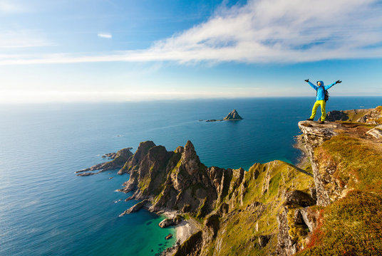 Happy young girl on Matinden summit, Vesteralen, Norway