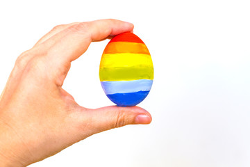 concept of LGBT. colorful egg in hand