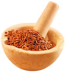 LINSEED IN PESTLE AND MORTAR CUT OUT