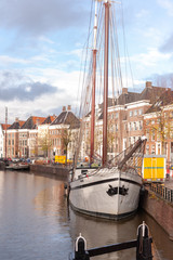 Scenic impression of the A river in the city of Groningen, showing the traditional houses along the...