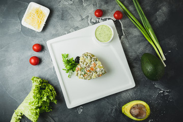 Salad with fresh vegetables. Tasty vegetarian food. Flat lay, top view