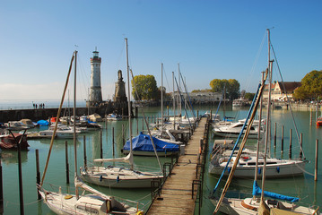 Harbour entrance of Lindau,  Lake Constance (German: Bodensee) with the new lighthouse and the...