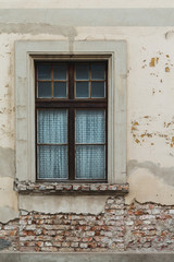Old brick wall with window - Stock image
