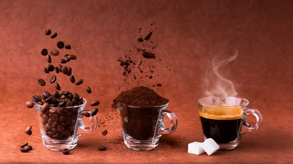 in glass cups, animated sequence with coffee beans, ground coffee, and steaming beverage. still life