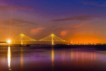 Fototapeta na wymiar Charleston Harbor bridge illuminated at sunset