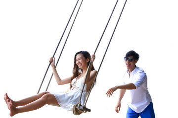 Isolate portrait of a couple play on swing  with clipping path