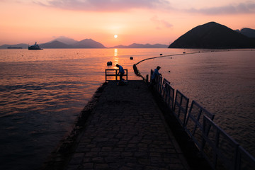 Silhouette of People on Sunset Beach at Repulse bay hong kong