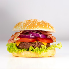 Burger with French fries cutlet with cheese and tomato