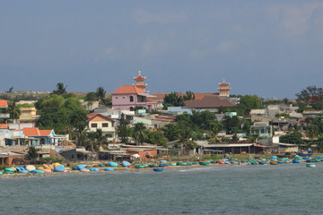 mui ne coast view of the village with fisher boats, vietnam