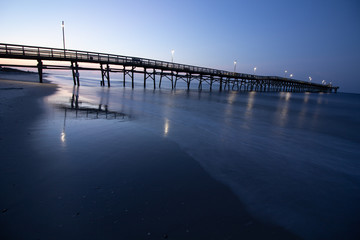 Fototapeta na wymiar Fishing Pier on Oak Island at Sunrise