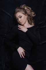 Naklejka premium Portrait of a beautiful young woman. Studio shot.