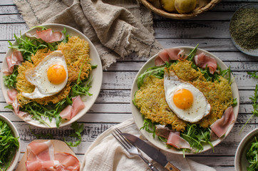 Potato pancakes with eggs and ham