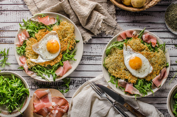 Potato pancakes with eggs and ham