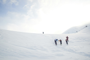 Fototapeta na wymiar Skitouring with amazing view of mountains in beautiful winter powder snow
