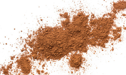 Pile cocoa powder isolated on white background. Top view