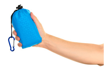 Very compact hand held blue nylon pocket blanket in a drawstring bag with a carabiner. Thin tarp or...