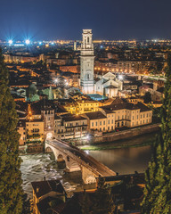 Overlooking the city at Sunset and night time, Verona Italy
