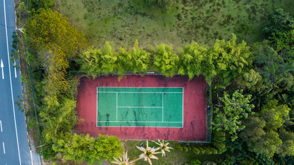 Old tennis court shot in bird's eye view